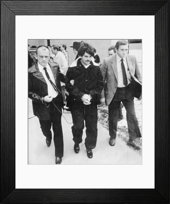 Framed Print : Bruce Davis with Two Officers