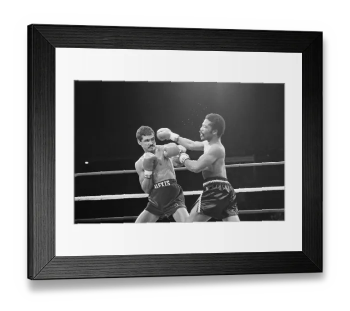 Framed Print : Aaron Pryor Hitting Alexis Arguello During Match