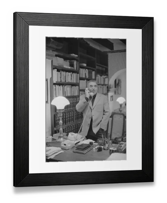 Framed Print : Gabriel Garcia Marquez Speaking on Telephone