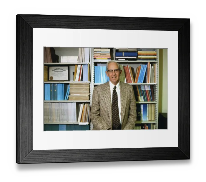 Framed Print : Nobel Prize Winner George Stigler Posing in Library Framed Print : Nobel Prize Winner George Stigler Posing in Library