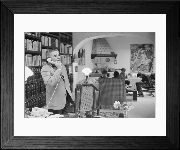 Framed Print : Gabriel Garcia Marquez on Phone Framed Print : Gabriel Garcia Marquez on Phone