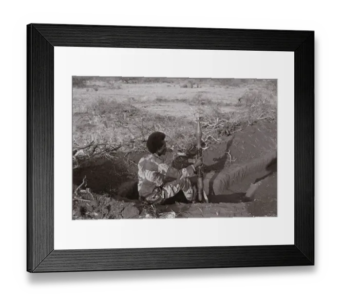 Framed Print : Somali Soldier Sitting with Weapon Framed Print : Somali Soldier Sitting with Weapon