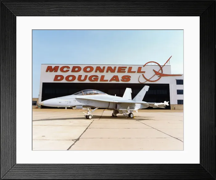 Framed Print : McDonnell Douglas Military Airplane in Front of Hangar Framed Print : McDonnell Douglas Military Airplane in Front of Hangar
