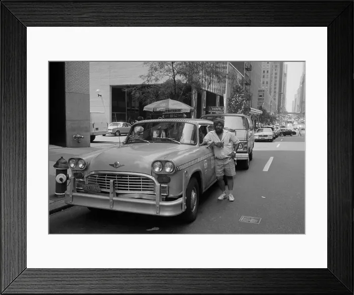Framed Print : Taxi Driver Leaning Against Checkered Cab Framed Print : Taxi Driver Leaning Against Checkered Cab