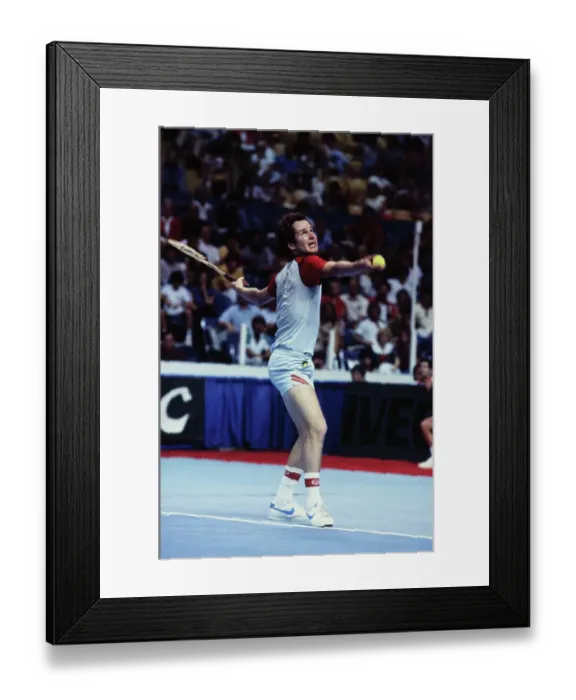 Framed Print : John McEnroe Serving Ball
