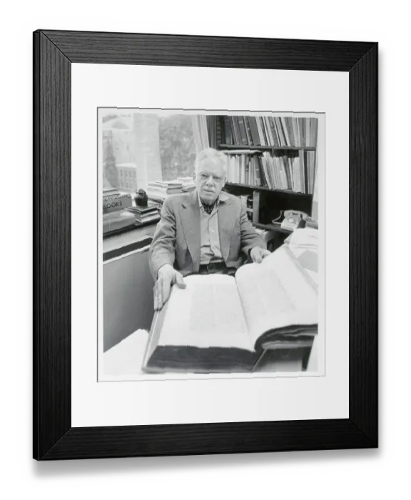 Framed Print : Man Displaying Large Dictionary Framed Print : Man Displaying Large Dictionary