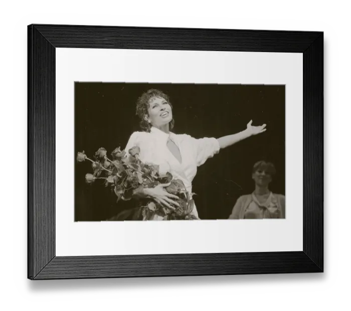 Framed Print : Raquel Welch Takes Bow with Bouquet Framed Print : Raquel Welch Takes Bow with Bouquet
