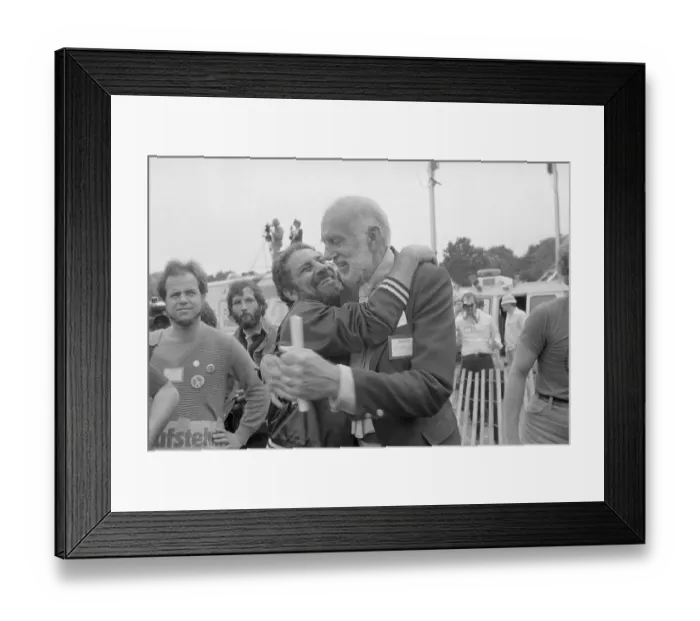 Framed Print : Abbie Hoffman Hugging Dr. Benjamin Spock