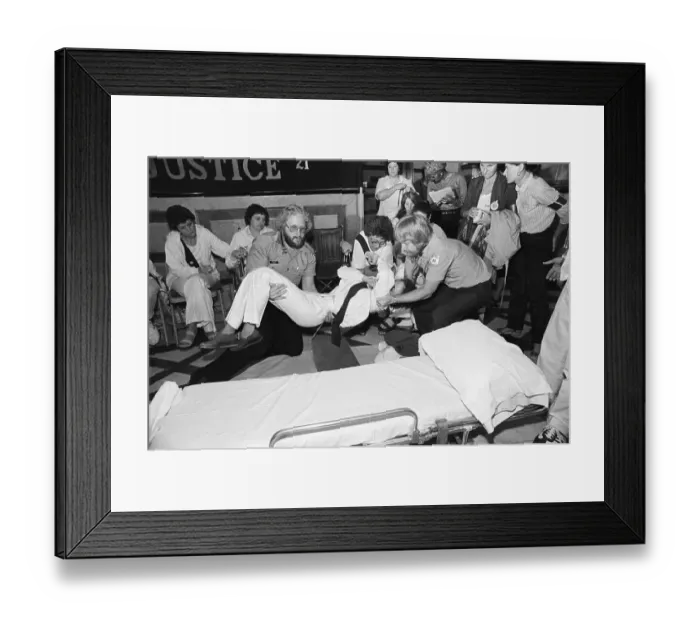 Framed Print : EMT's Lifting Woman onto Stretcher Framed Print : EMT's Lifting Woman onto Stretcher