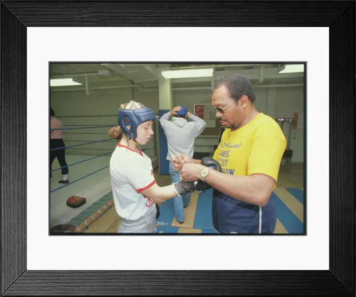 Framed Print : Coach Tying Boxing Gloves Framed Print : Coach Tying Boxing Gloves