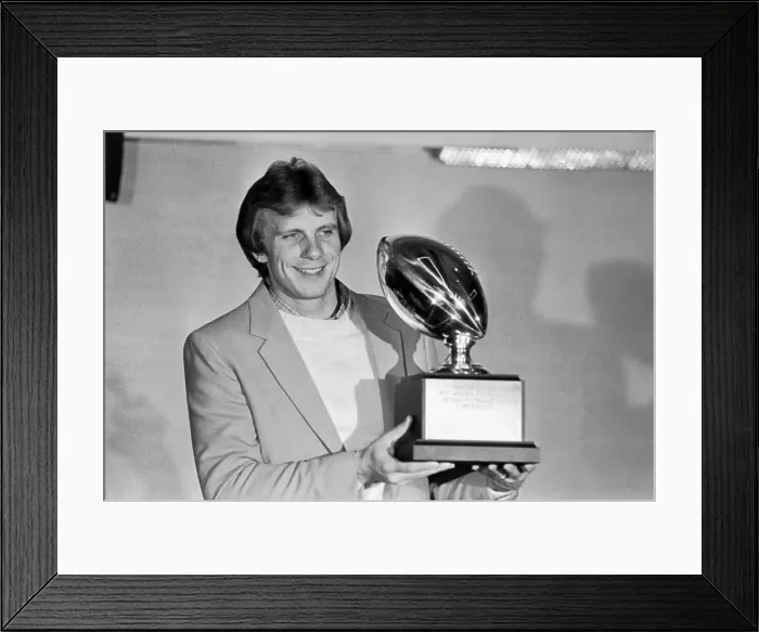 Framed Print : Joe Montana Holds Most Valuable Player Trophy Framed Print : Joe Montana Holds Most Valuable Player Trophy