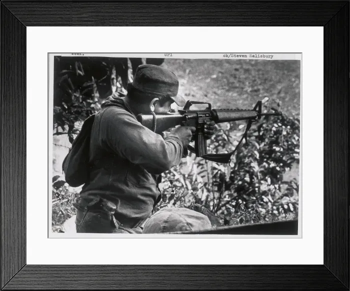 Framed Print : Waist Up Of Soldier Shooting Machine Gun Framed Print : Waist Up Of Soldier Shooting Machine Gun