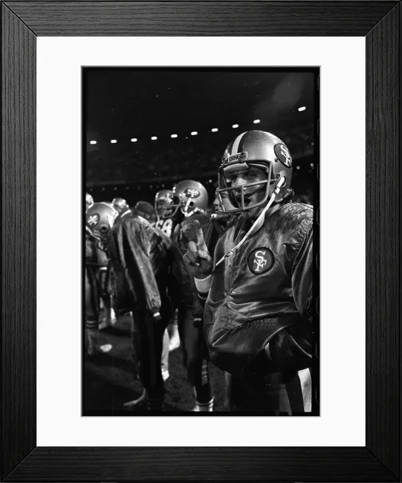 Framed Print : Joe Montana Holds up Number One Sign Framed Print : Joe Montana Holds up Number One Sign
