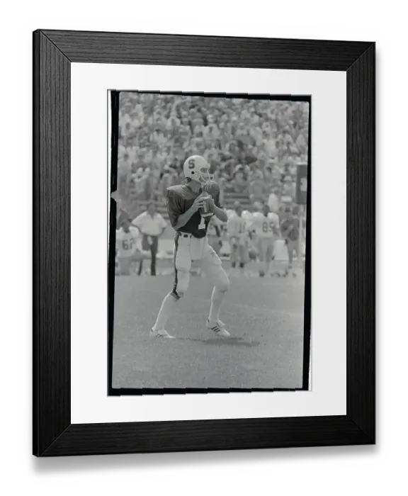 Framed Print : John Elway Holding The Football