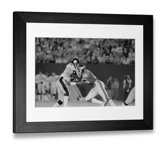 Framed Print : Lawrence Taylor Stopping Terry Bradshaw in Football Play