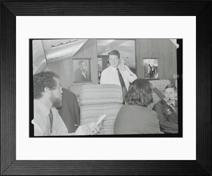 Framed Print : Ronald Reagan Listening to Reporter's on Air Force One Framed Print : Ronald Reagan Listening to Reporter's on Air Force One