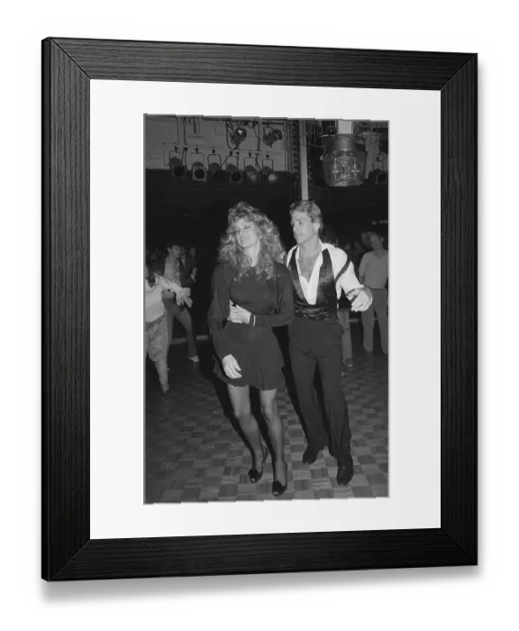 Framed Print : Farrah Fawcett and Ryan O'Neal Getting Ready to Dance Framed Print : Farrah Fawcett and Ryan O'Neal Getting Ready to Dance