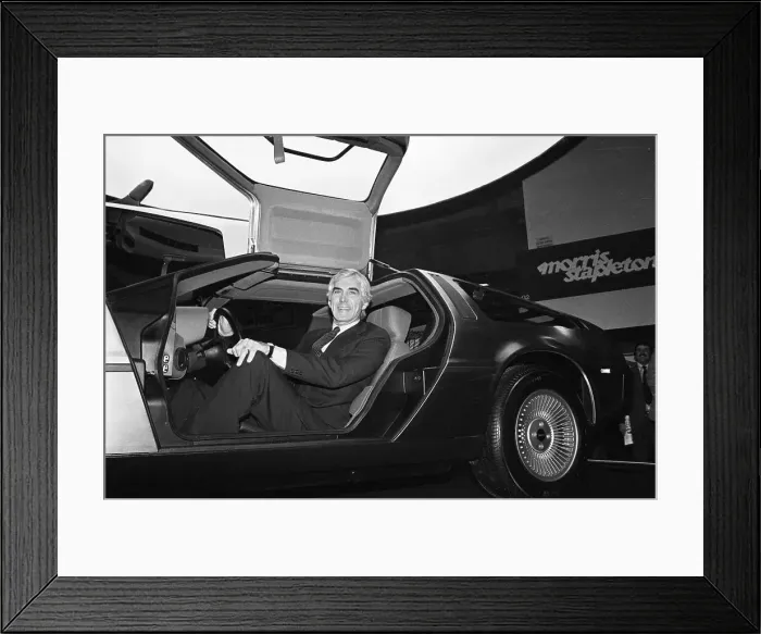 Framed Print : John DeLorean Sitting in Sports Car Framed Print : John DeLorean Sitting in Sports Car