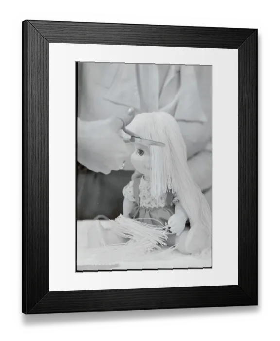 Framed Print : Woman Cutting Doll's Hair Framed Print : Woman Cutting Doll's Hair