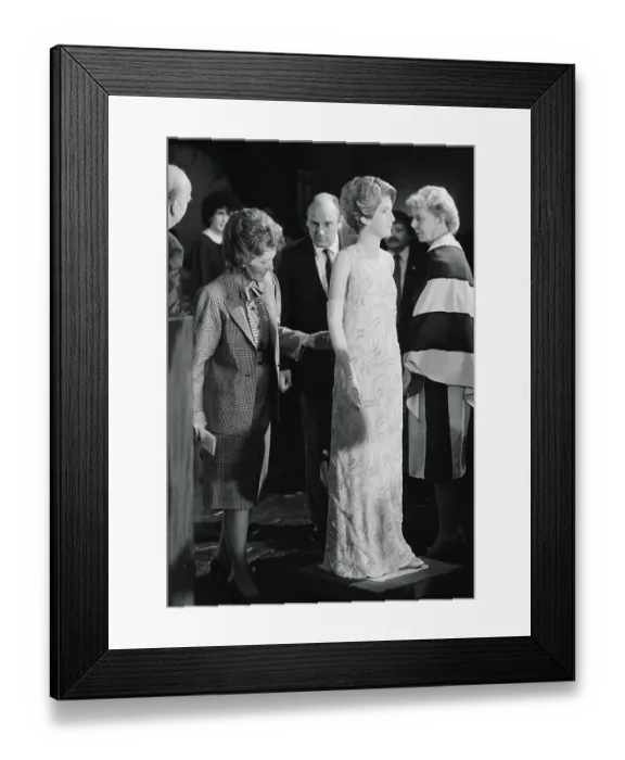 Framed Print : Nancy Reagan Inspecting a Ball Gown Framed Print : Nancy Reagan Inspecting a Ball Gown