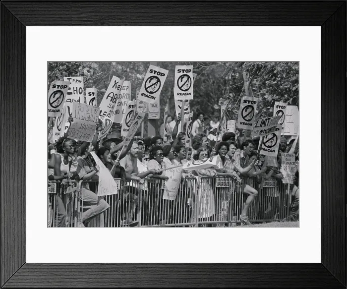 Framed Print : Reagan Protesters Holding up Signs Framed Print : Reagan Protesters Holding up Signs