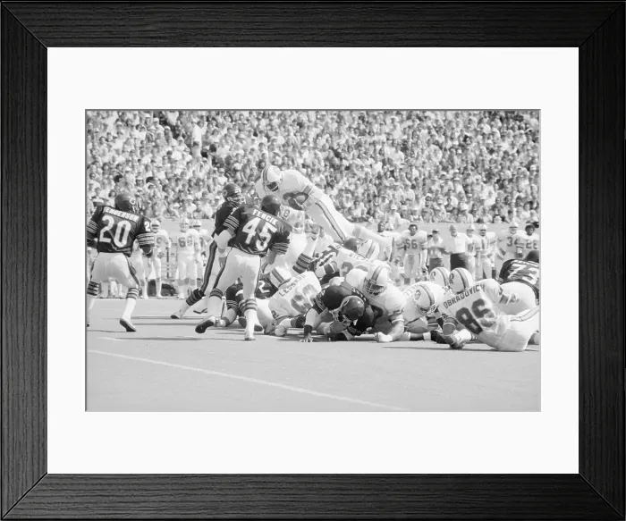 Framed Print : Bell Leaps for First Down Framed Print : Bell Leaps for First Down