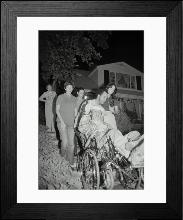 Framed Print : James Brady Being Wheeled in Chair
