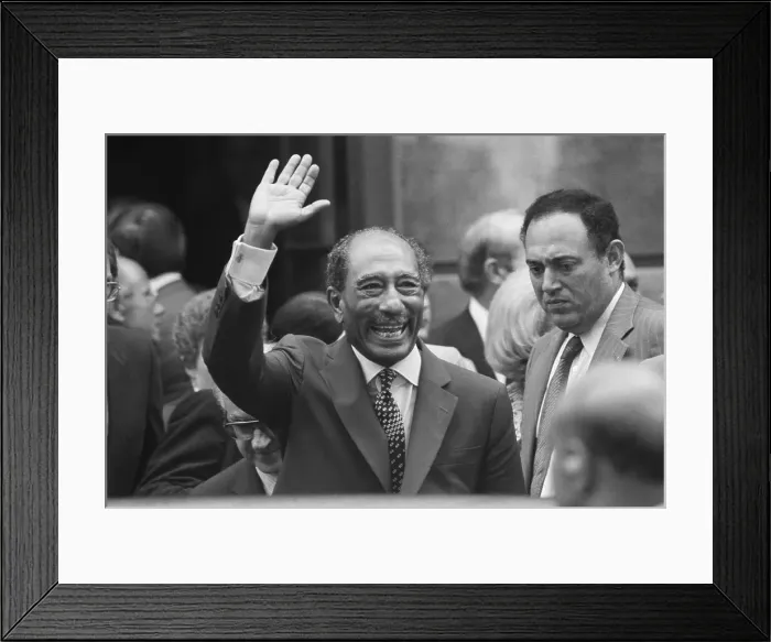 Framed Print : President Anwar Sadat Waves to Crowd Framed Print : President Anwar Sadat Waves to Crowd