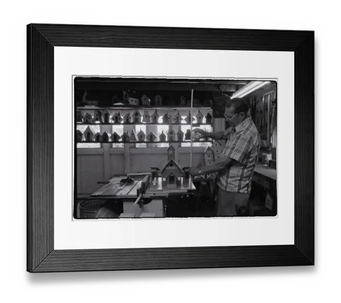 Framed Print : Man Measuring Pole for Birdhouse Framed Print : Man Measuring Pole for Birdhouse