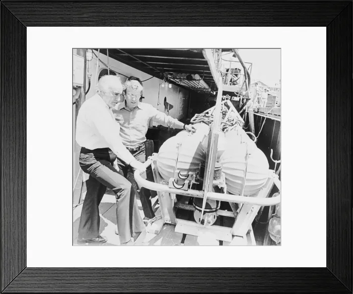 Framed Print : Tycoon Jack Grimm and Associate with Oceanography Device Framed Print : Tycoon Jack Grimm and Associate with Oceanography Device