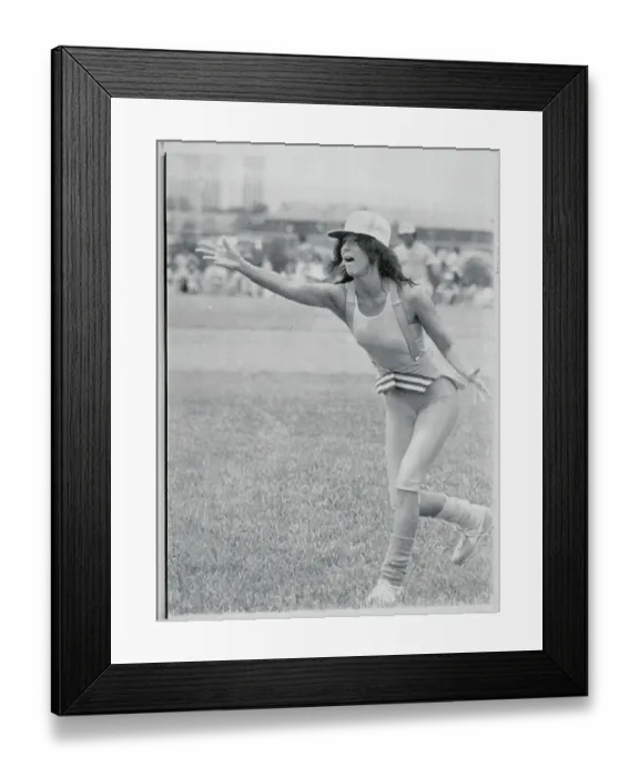 Framed Print : Cher Pitching During Softball Game Framed Print : Cher Pitching During Softball Game