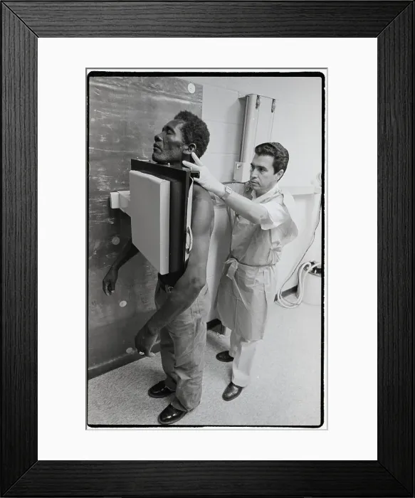 Framed Print : Haitian Refugee Readied For X-Ray Framed Print : Haitian Refugee Readied For X-Ray