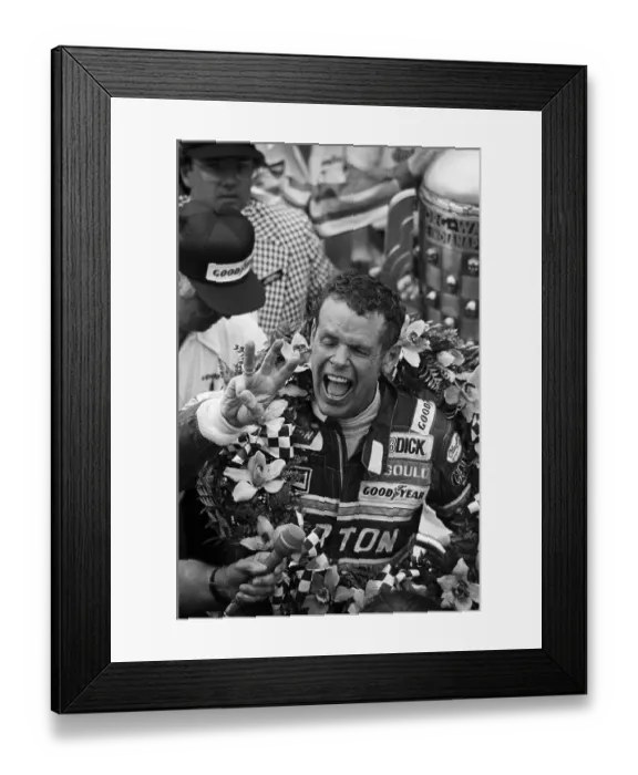 Framed Print : Bobby Unser Gesturing with His Fingers