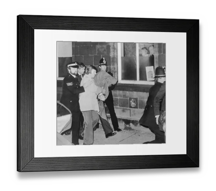 Framed Print : Peter Sutcliffe Walking with Police Guards Framed Print : Peter Sutcliffe Walking with Police Guards