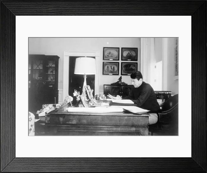 Framed Print : Ronald Reagan Reading at Desk Framed Print : Ronald Reagan Reading at Desk