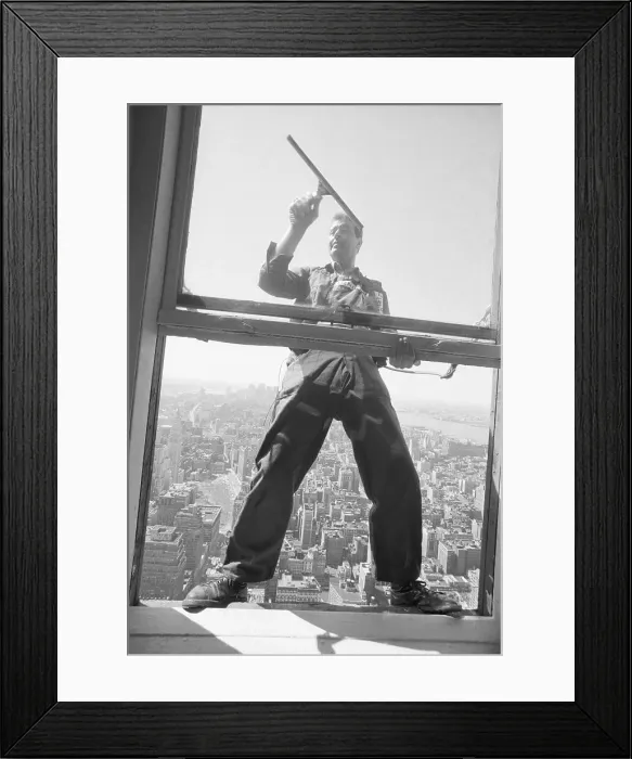 Framed Print : Window Washer Hanging Outside Window Framed Print : Window Washer Hanging Outside Window