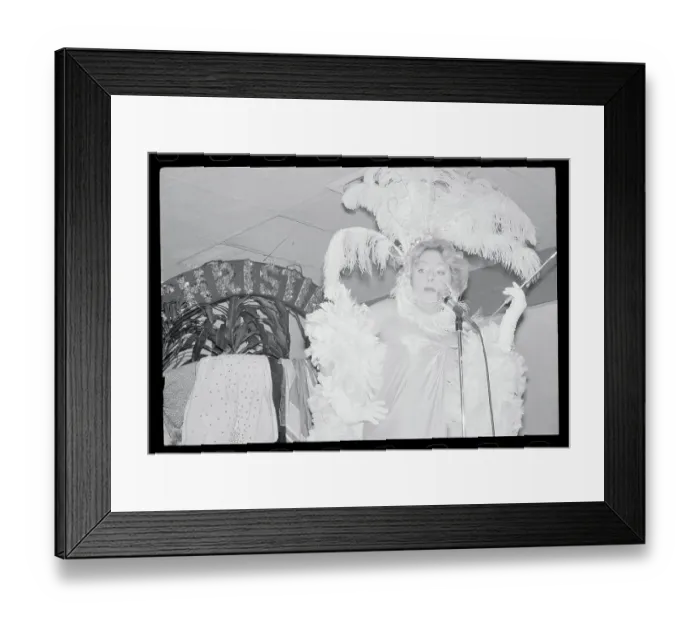 Framed Print : Christine Jorgensen in Frilly Costume and Singing at Microphone Framed Print : Christine Jorgensen in Frilly Costume and Singing at Microphone