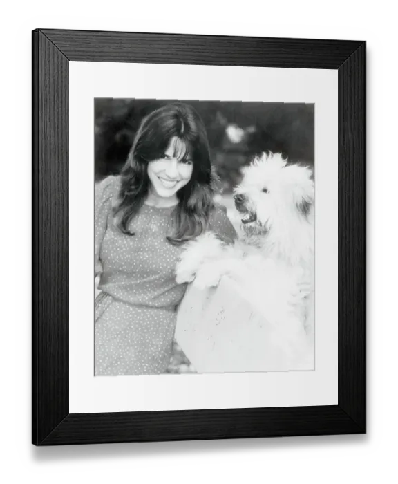 Framed Print : Patti Davis Smiling with Dog Framed Print : Patti Davis Smiling with Dog