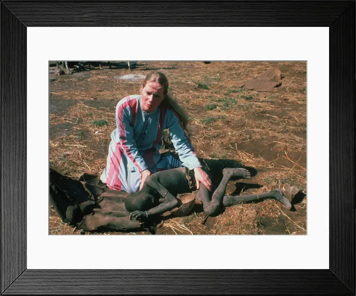 Framed Print : Liv Ullman Comforting Dying Child Framed Print : Liv Ullman Comforting Dying Child