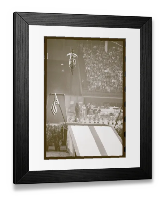 Framed Print : Motorcycle Approaching Ramp