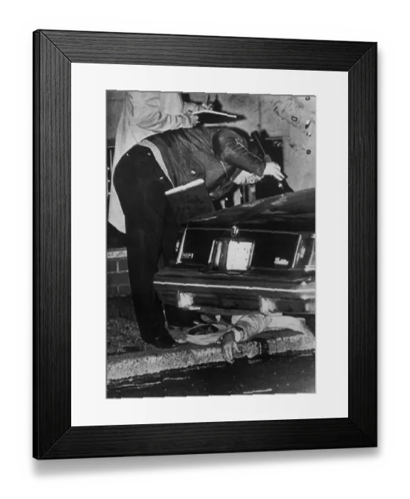 Framed Print : Policeman Inspecting a Car