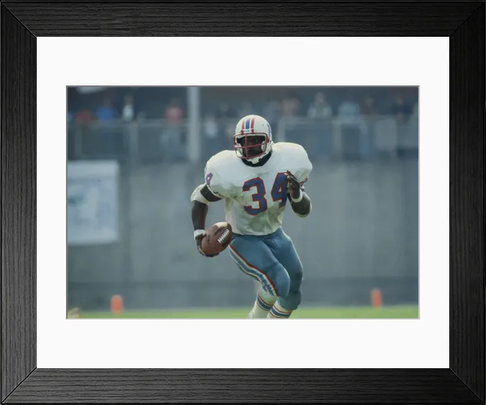 Framed Print : Football Player Carrying Ball Framed Print : Football Player Carrying Ball