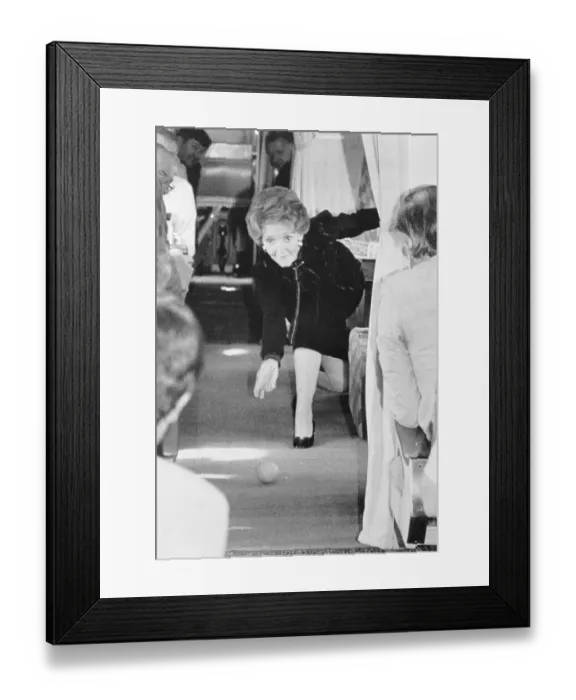 Framed Print : Nancy Reagan Rolling an Orange Down Airplane Isle Framed Print : Nancy Reagan Rolling an Orange Down Airplane Isle