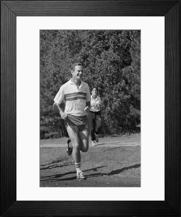 Framed Print : George Bush Jogging Framed Print : George Bush Jogging