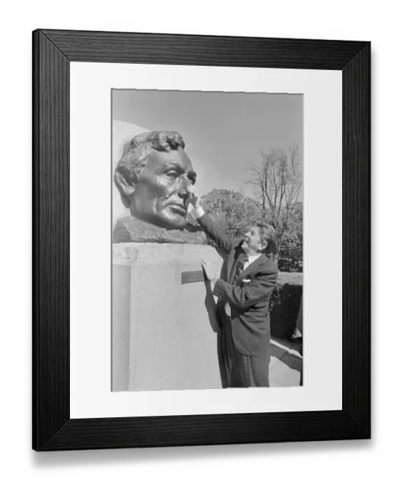 Framed Print : Ronald Reagan Rubbing the Nose of a Bust Framed Print : Ronald Reagan Rubbing the Nose of a Bust