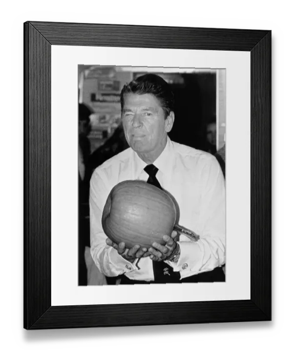 Framed Print : Ronald Reagan Holding a Pumpkin