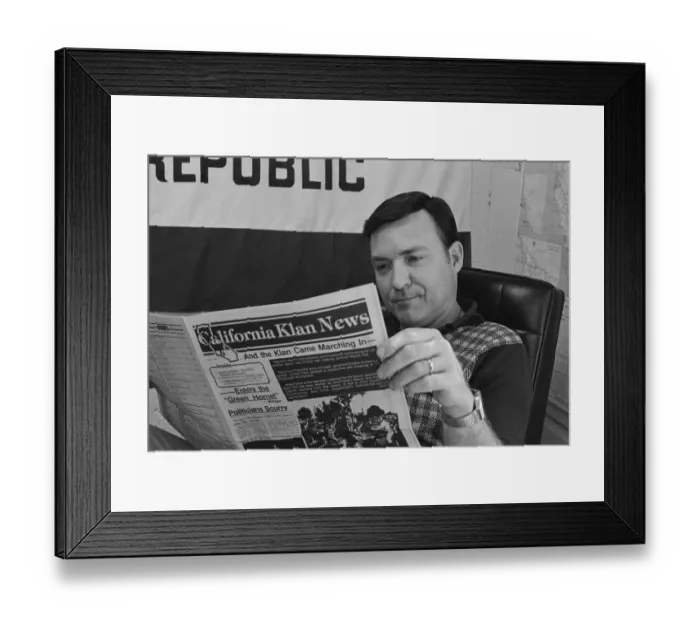 Framed Print : Tom Metzger Reading Newspaper