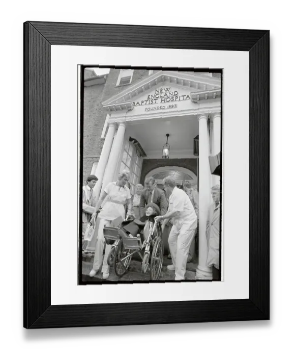 Framed Print : Rose Kennedy Being Wheeled out of Hospital Entrance