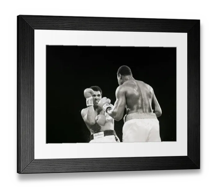 Framed Print : Muhammad Ali Blocking Larry Holmes Punch Framed Print : Muhammad Ali Blocking Larry Holmes Punch