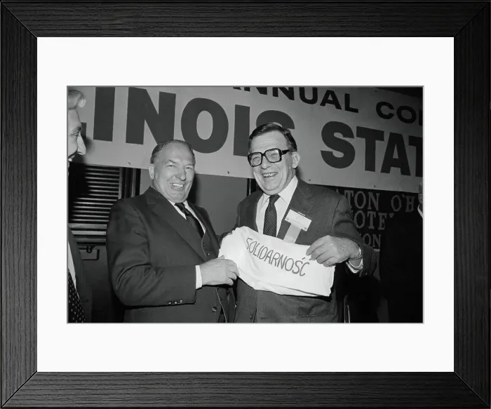 Framed Print : Stanislaw Walesa Giving T-Shirt to Lane Kirkland Framed Print : Stanislaw Walesa Giving T-Shirt to Lane Kirkland